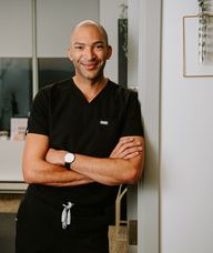 Book an Appointment with Corey Akisanya for Medical Aesthetics